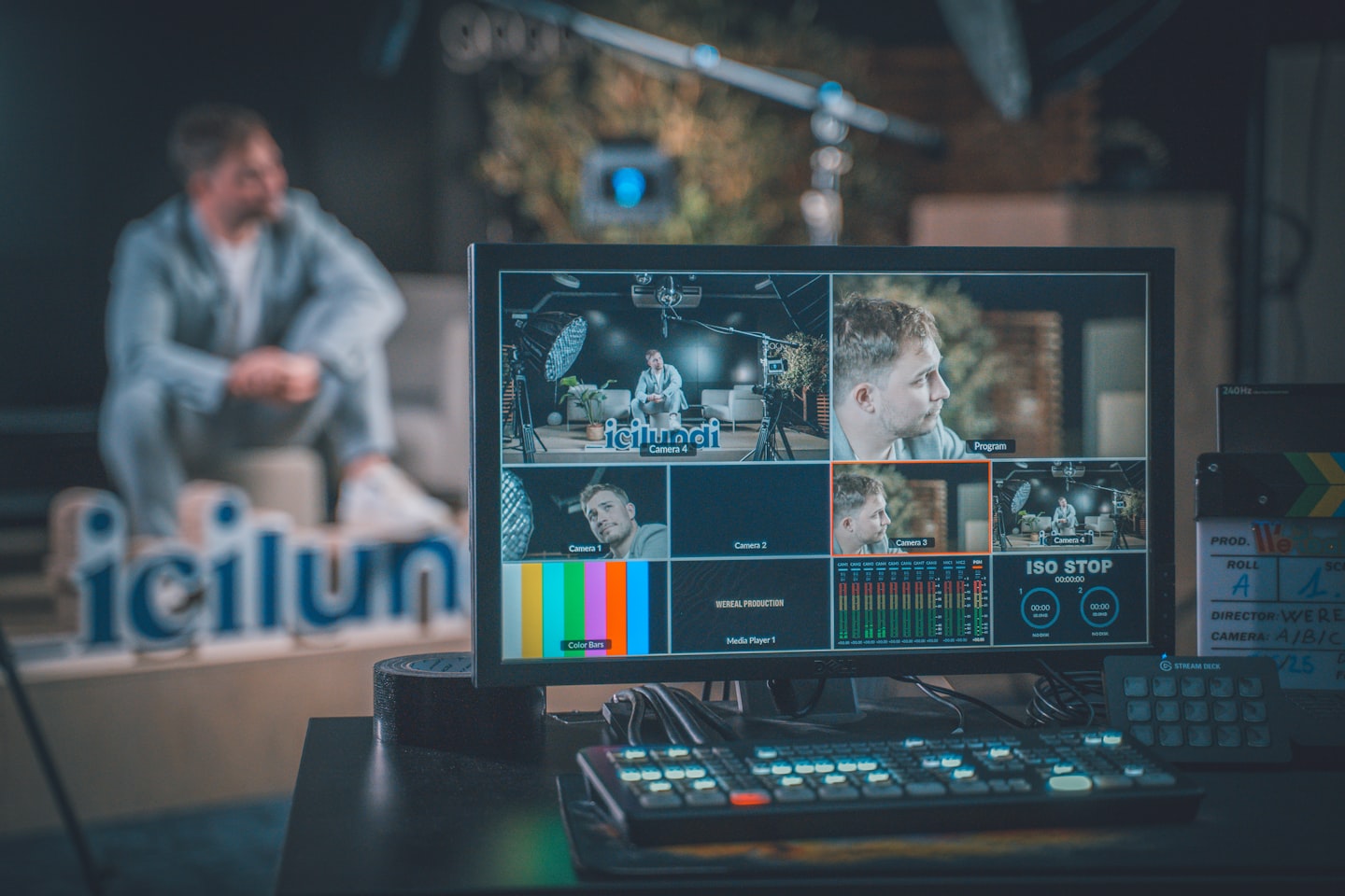 Live stream studio setup with a creator workspace and streaming monitor