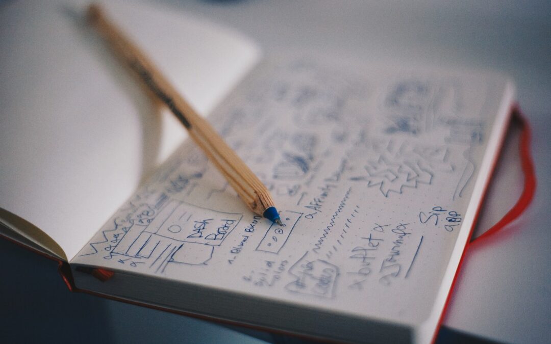 Founder reviewing MVP wireframes and product flow in a modern startup workspace