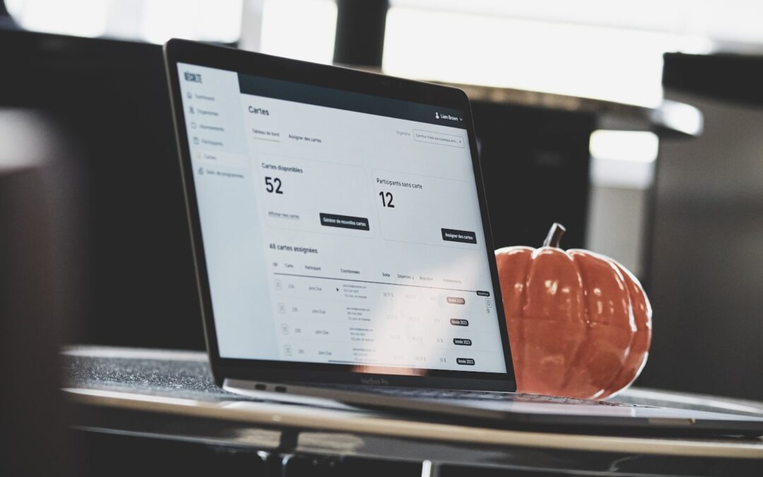 Barbershop owner reviewing a scheduling app on a tablet in a modern barbershop